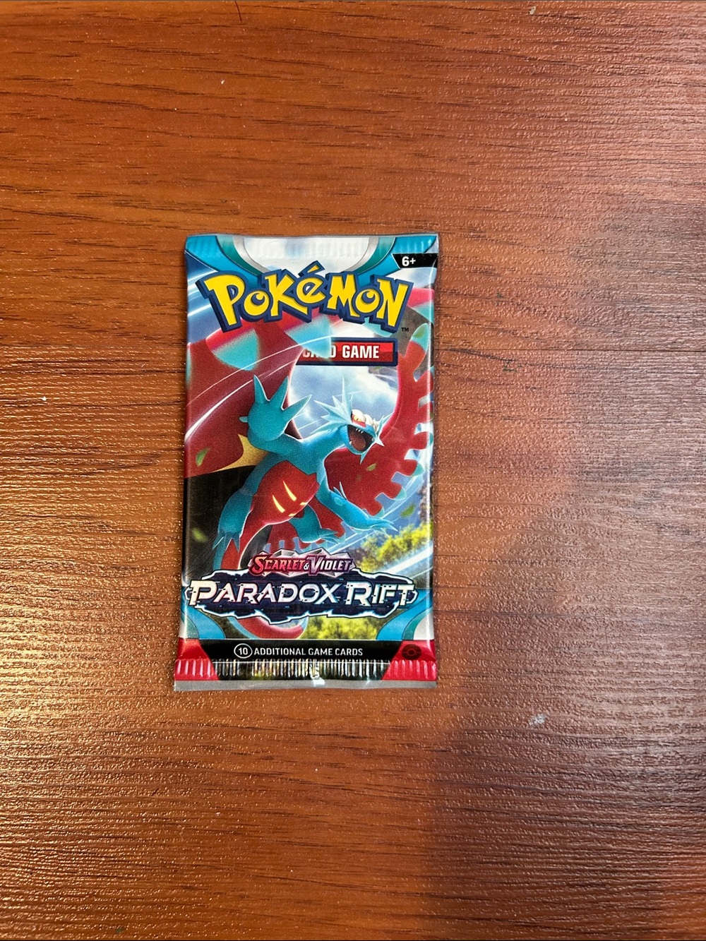 Pokemon Paradox Rift Booster Pack - Red & Teal